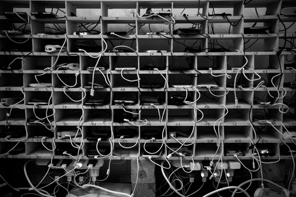 A mobile phone charging station at the info point, opened and run by solidarity volunteers.