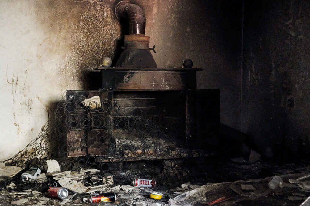 Shelters, abandoned houses, and buildings destroyed by war and never rebuilt are the places where thousands of people on the run find refuge, hiding like hunted animals. Somewhere between Bosnia and Herzegovina and Croatia, 2019.
