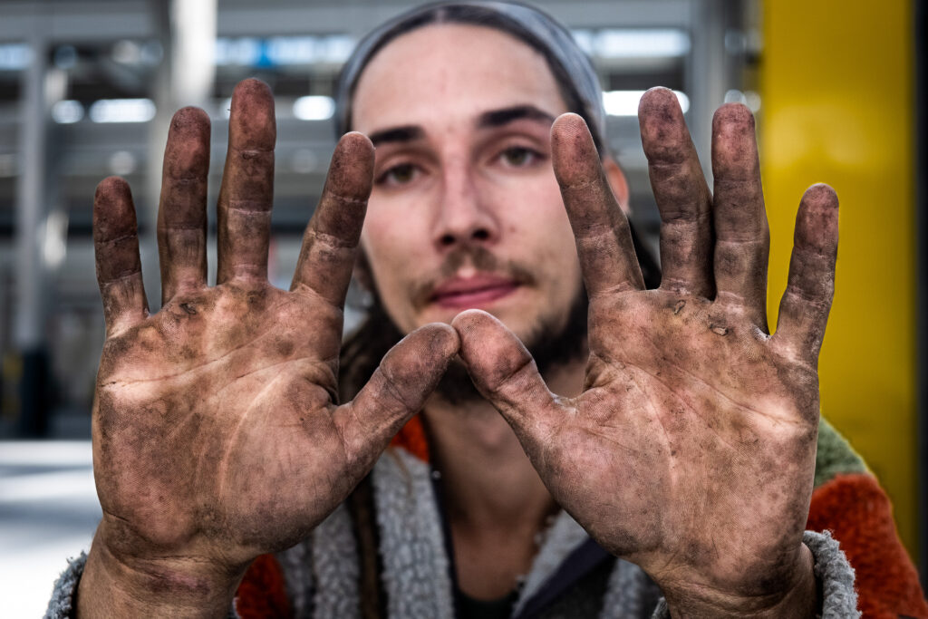 Jarno, 22, works as a lumberjack during the winter and spends the summer travelling across Italy with a team of scaffholders working on concert stages. “I like hard work and being exhausted at the end of the day. And it’s nice doing it for music.” Turin, November 2022.
