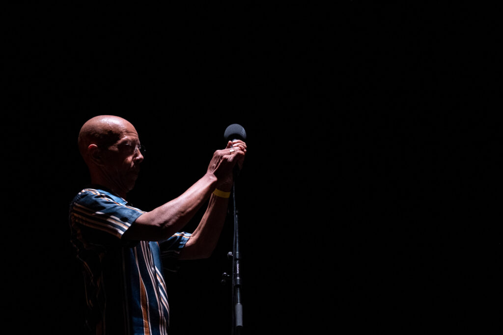 A backliner checks the artist’s microphone one last time before the beginning of the show. Padua, July 2022.